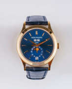 Patek Philippe. Patek Philippe. Herren-Armbanduhr 'Annual Calendar Blue'.