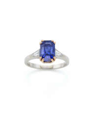 Octagonal ct. 5.64 sapphire, tapered diamond, plat…