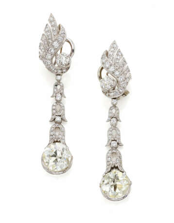 Diamond, white gold and platinum earrings accented… - photo 1