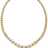 Round diamond and yellow gold graduated necklace, … - фото 1