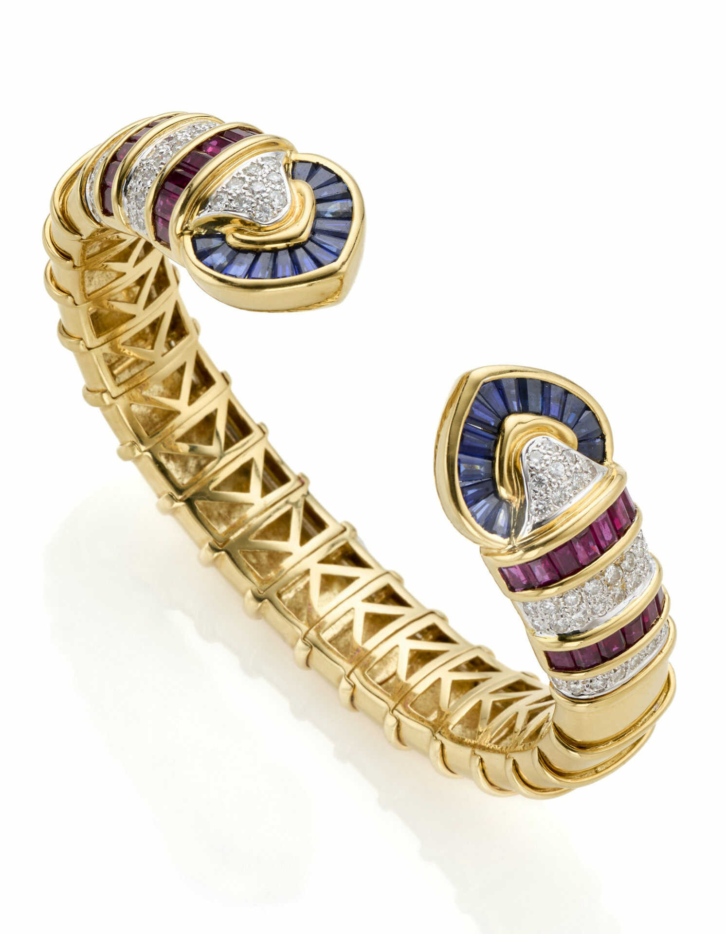 Diamond, sapphire and ruby yellow gold bangle brac…