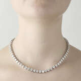 Round diamond and white gold tennis necklace, diam… - photo 2