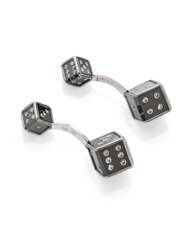 Dice shaped white gold cufflinks with four black c…