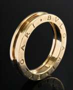 Каталог товаров. Bulgari &quot;B. Zero 1&quot; Gelbgold 750 Ring mit seitlichem Bulgari Schriftzug, innen sign., 9,1g, Gr. 63,5, Breite 5mm, Tragespuren