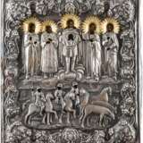 A FINE ICON SHOWING STS. FLORUS AND LAURUS WITH SILVER OKLAD - Foto 1