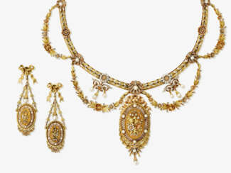 A parure consisting of a necklace and a pair of drop earrings in tricolour gold with small pearls. Paris, circa 1880