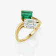 A Vis a Vis ring decorated with an emerald-cut diamond and a square-cut Colombian emerald. France, Paris, Art Dèco 1925 - Now at the auction