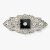 A brooch with onyx and diamonds. Probably Germany, 1930s - photo 1