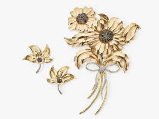 A demi-parure, consisting of a large brooch in the shape of a flower bouquet and matching earrings. Italy, 1940s