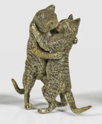 Group of figures with cats as a loving couple