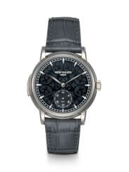 PATEK PHILIPPE, REF. 5078G-010, A RARE AND ATTRACTIVE GOLD MINUTE REPEATING WRISTWATCH WITH BLACK GRAND FEU ENAMEL DIAL