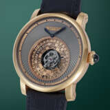 CARTIER, ROTONDE DE CARTIER ASTROCALENDAIRE, A RARE AND INVENTIVE LIMITED EDITION GOLD TOURBILLON WITH MULTI-TIER CIRCULAR PERPETUAL CALENDAR DISPLAY - photo 2