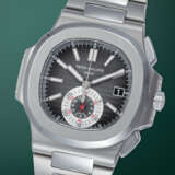 PATEK PHILIPPE, NAUTILUS REF. 5980/1A-014, AN ATTRACTIVE STAINLESS STEEL AUTOMATIC CHRONOGRAPH WRISTWATCH - фото 2