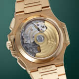 PATEK PHILIPPE, NAUTILUS REF. 5980/1R-001, A FINE GOLD AUTOMATIC FLYBACK CHRONOGRAPH WRISTWATCH WITH BRACELET - фото 3