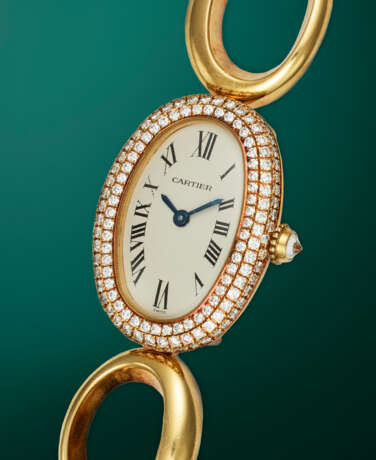 CARTIER, BAIGNOIRE REF.1967, AN ATTRACTIVE GOLD AND DIAMOND-SET BRACELET WATCH - photo 2