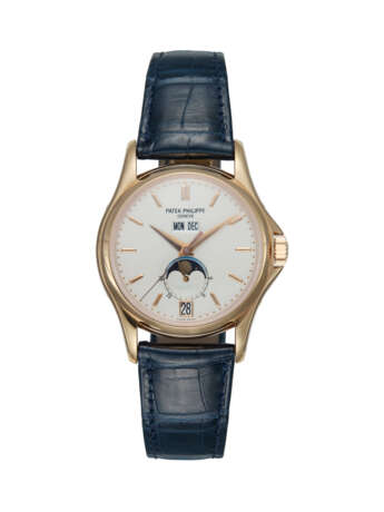 PATEK PHILIPPE, REF. 5125R-010 W125, A LIMITED EDITION GOLD AUTOMATIC ANNUAL CALENDAR WRISTWATCH - photo 1