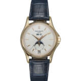 PATEK PHILIPPE, REF. 5125R-010 W125, A LIMITED EDITION GOLD AUTOMATIC ANNUAL CALENDAR WRISTWATCH - photo 1