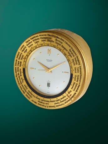 HERMES, A RARE GILT BRASS MANUAL-WINDING WORLDTIME DESK CLOCK - photo 2