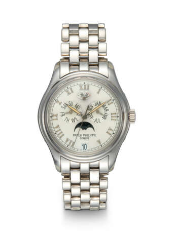 PATEK PHILIPPE, REF. 5036/1G-017, A FINE GOLD AUTOMATIC ANNUAL CALENDAR WRISTWATCH WITH BRACELET - Foto 1