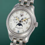 PATEK PHILIPPE, REF. 5036/1G-017, A FINE GOLD AUTOMATIC ANNUAL CALENDAR WRISTWATCH WITH BRACELET - Foto 2