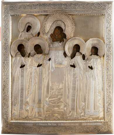 AN ICON SHOWING THE KORSUNSKAYA MOTHER OF GOD AND FIVE SELECTED SAINTS WITH SILVER OKLAD - photo 1