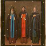 AN ICON SHOWING STS. MAKARI, JOANNICIUS THE GREAT AND SAVVA WITH SILVER-GILT AND CHAMPLEVÉ ENAMEL OKLAD - photo 2