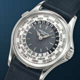 PATEK PHILIPPE. AN ATTRACTIVE PLATINUM AUTOMATIC WORLD TIME WRISTWATCH - photo 2