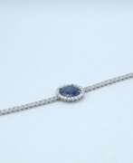 Overview. White gold bracelet with diamonds and sapphire