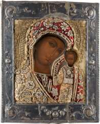 A FINE ICON SHOWING THE KAZANSKAYA MOTHER OF GOD WITH SILVER RIZA AND EMBROIDERY