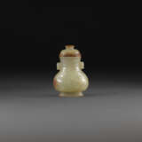 A MINIATURE CARVED YELLOWISH-CELADON JADE ARCHAISTIC VASE AND COVER - photo 1