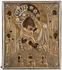 AN ICON SHOWING THE 'POCHAEVSKAYA' MOTHER OF GOD WITH A SILVER-GILT OKLAD WITHIN A FRAME