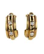 Diamanten. Boucles d`oreilles en or 18 carats avec diamants. Piaget Possession.1991. 