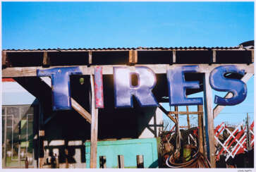 William Eggleston. Untitled (Tires sign, Arizona)