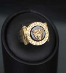 Women`s gold ring with onyx Gorgon jellyfish