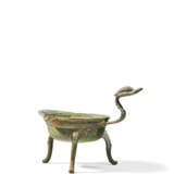 A BRONZE DUCK-FORM VESSEL, JIAODOU - Foto 1