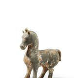 A PAINTED POTTERY FIGURE OF A STANDING HORSE - photo 1