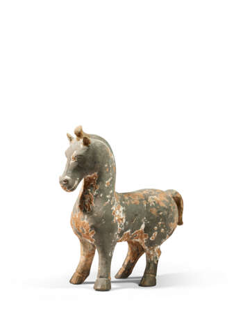 A PAINTED POTTERY FIGURE OF A STANDING HORSE - photo 1