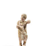 A PAINTED POTTERY FIGURE OF A FOREIGN DANCER - photo 1