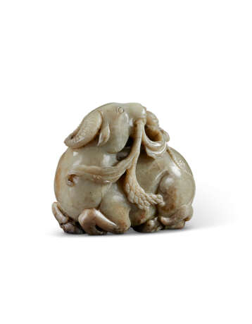 A MOTTLED CREAMY BEIGE AND PALE BROWN JADE CARVING OF A BUFFALO AND A BOY - photo 2