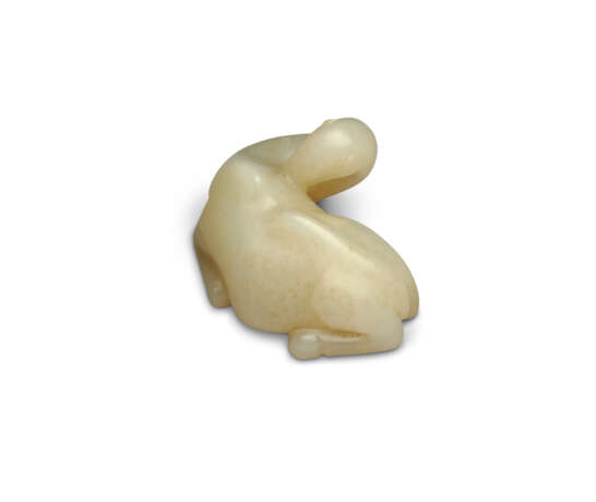 A SMALL PALE CELADON JADE CARVING OF A RECUMBENT CAMEL - photo 3