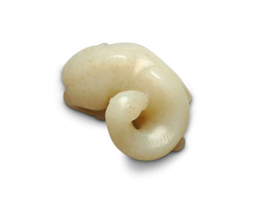 A SMALL PALE CELADON JADE CARVING OF A RECUMBENT CAMEL - photo 4