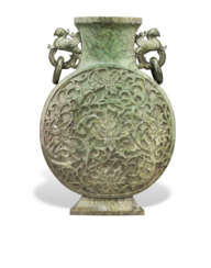 A SPINACH GREEN JADE TWO-HANDLED VASE