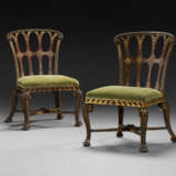 A PAIR OF GEORGE II MAHOGANY AND PARCEL-GILT CHAIRS - photo 1