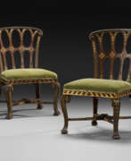 Bois doré. A PAIR OF GEORGE II MAHOGANY AND PARCEL-GILT CHAIRS