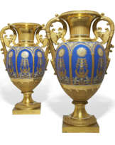 A PAIR OF LARGE TWO-HANDLED IMPERIAL PORCELAIN VASES