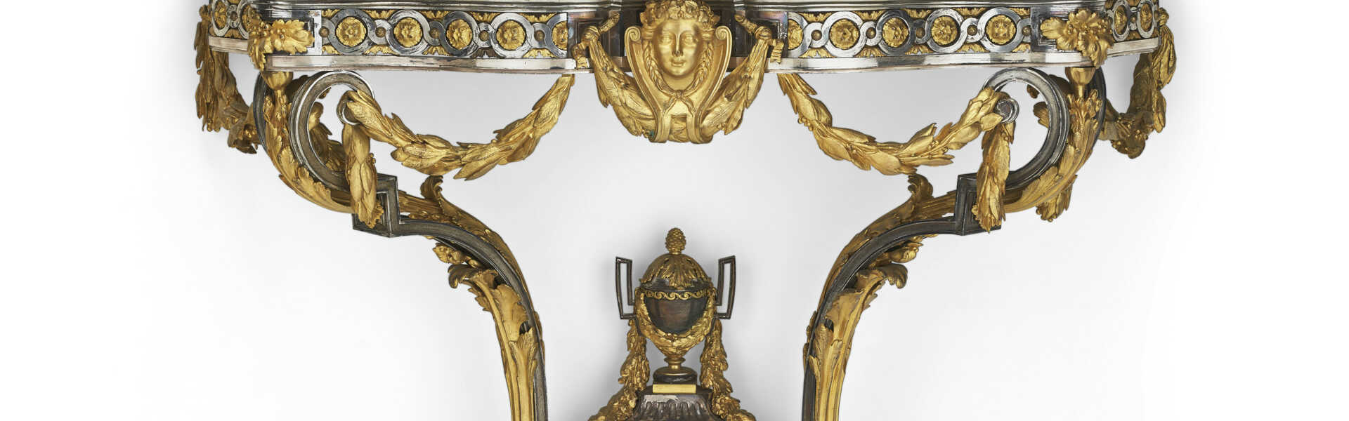 A FINE ORMOLU AND SILVERED-BRONZE CONSOLE TABLE