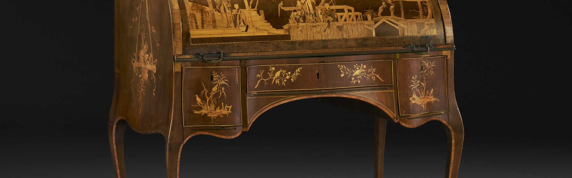 A GERMAN BRASS-MOUNTED SYCAMORE,TULIPWOOD AND MARQUETRY BUREAU