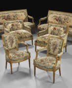 Neoclassicism. A SUITE OF LOUIS XVI GILT WALNUT AND BEAUVAIS TAPESTRY SEAT FURNITURE