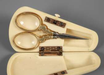 Miniature pair of scissors in ivory case