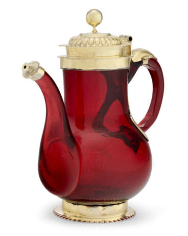 A CONTINENTAL SILVER-GILT MOUNTED RUBY GLASS WINE JUG - photo 1